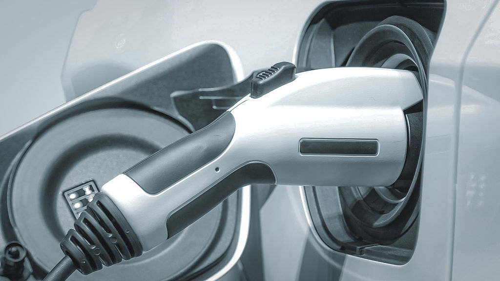 Charging plug in an electric vehicle